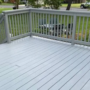 Grey-stained deck with white rails, modern look