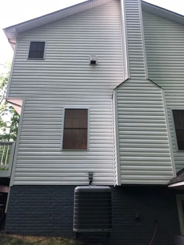 Townhouse exterior fully cleaned, siding restored to original color